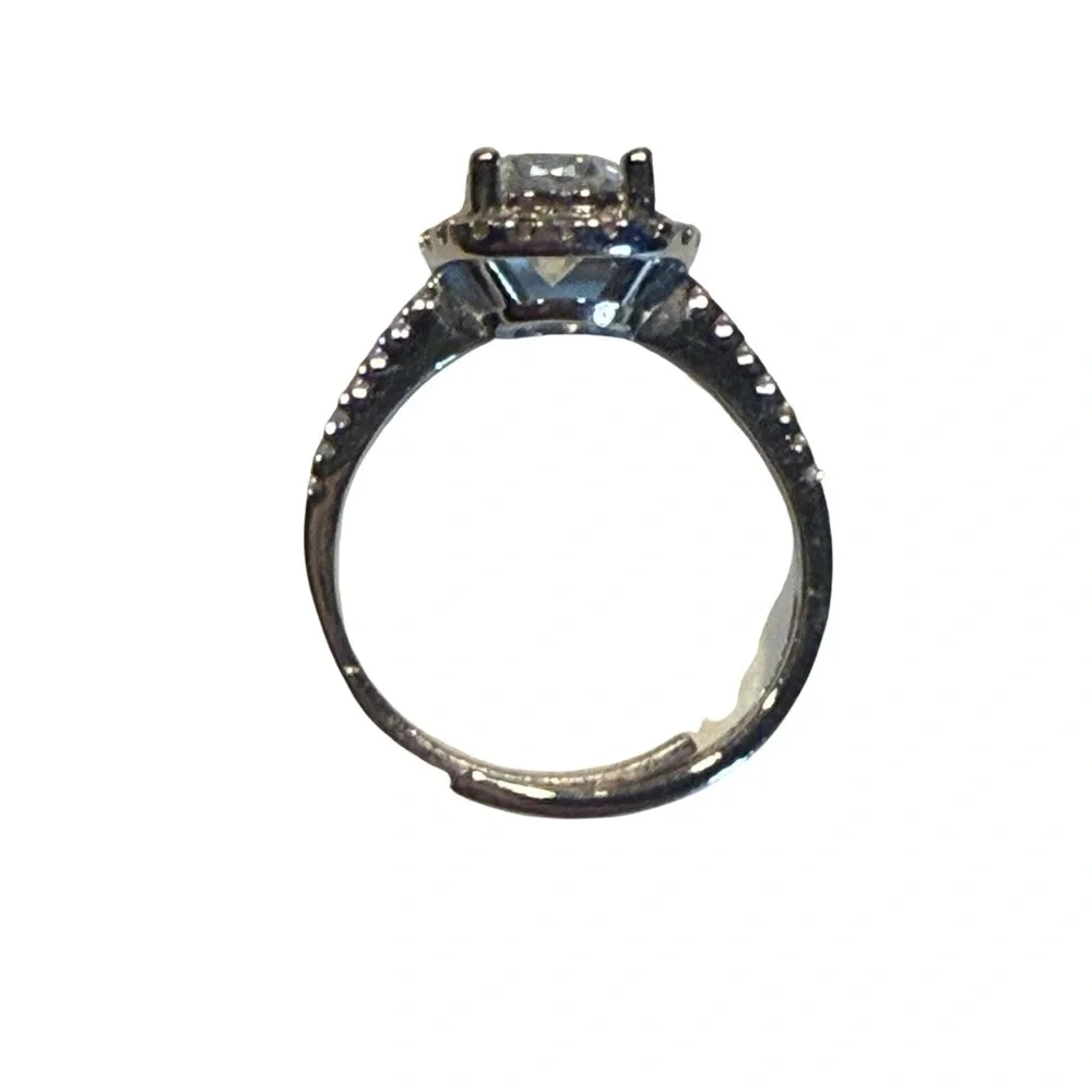 3.0ct Silver Halo Cushion-Cut Moissanite Engagement Ring.